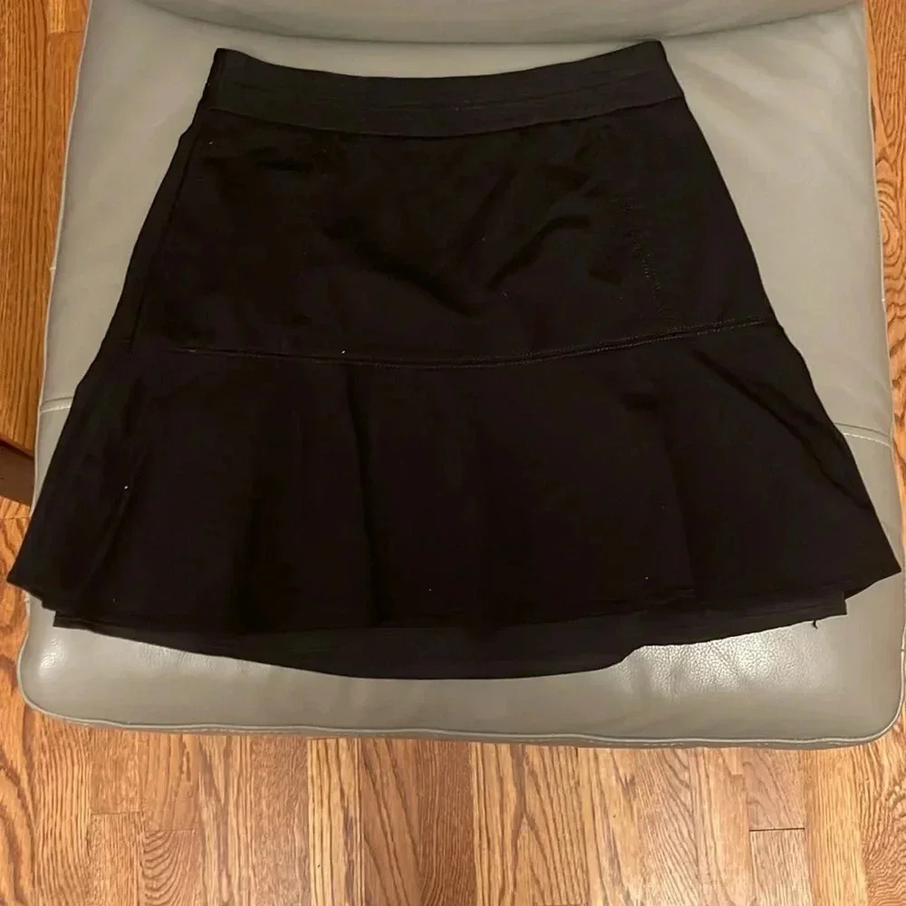 White House Black Market flared black skirt size 6
